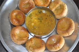 Daal baati - Its another Indian delicacy - a Rajasthani traditional dish followed in the central parts of India as well.