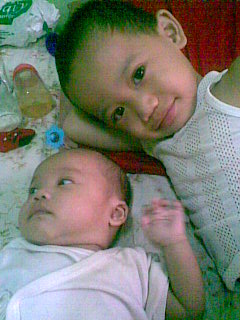 my children - this is a picture of my second son with my youngest..taken last 2010..