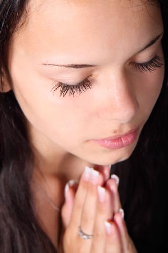 Praying - a girl praying.