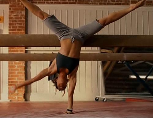 Missy Peregrym in "Stick It" - Missy Peregrym doing a handstand in practice in the movie "Stick It."