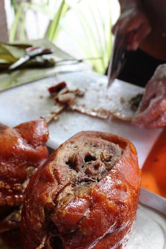 Boneless Lechon - The image of the meat of a roasted pig with bones removed, a famous dish in the Philippines.