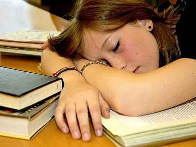 sleeping  - hard working students are sleep-deprived.