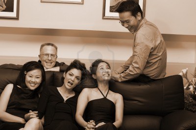 hang out with friends - http://www.123rf.com/photo_12645227_men-and-women-hanging-around-the-couch-after-dinner.html