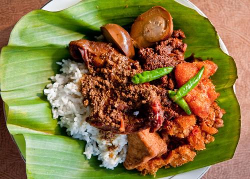 gudeg yogyakarta - Gudeg is Yogyakarta's tradional food. It made by jackfruit and brown sugar. It's delicious, sweet and yummy. You can mix gudeg with rice too.