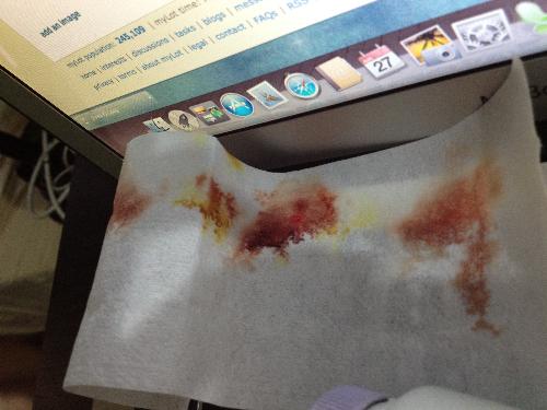 dried blood - This is the wax strip I had used to wrap my cut finger after putting some Betadine on it lol. No bandage wrap at home!