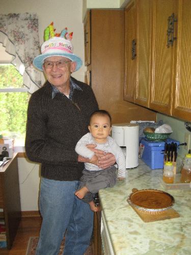 Grandpa with a grandson - This was taken at my 75th birthday party. My grandson was almost one year old at the time.