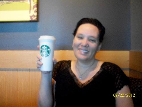 Me and my Starbucks - Here is me with my Starbucks drink.