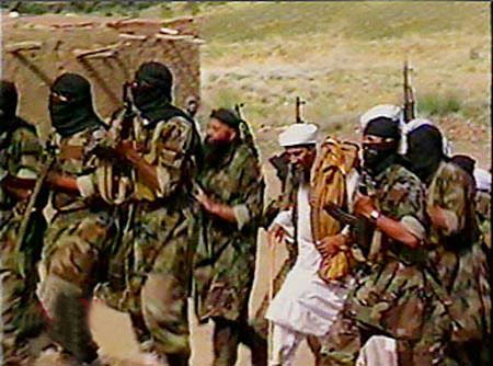 men with guns - al-qaeda members :(