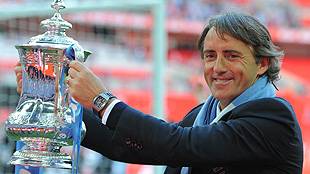 Mancini won the league and cup for Manchester City - Mancini won the league and cup for Manchester City. So he must have done right.