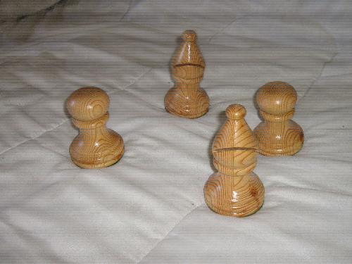 Sample chess pieces turned extra large. - Turned these just for the fun of it. They are really quite large. Almost three and a half inches in diameter. 