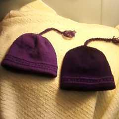 Two Hats - These are the first two hats I knitted using a circular needle. Everyone tells me how great they are and that I should sell them. Maybe next year. I have too many to make for Christmas! Two Hats - These are the first two hats I knitted using a circular needle. Everyone tells me how great they are and that I should sell them. Maybe next year. I have too many to make for Christmas!