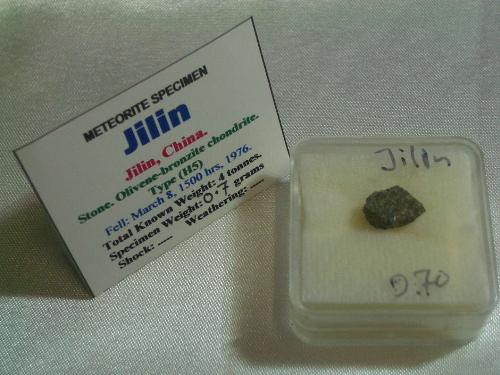 Jilin meteorite - The sample of the Jilin meteorite in the collection here in Australia.
It lives mostly in store, waiting.
It weighs 0.7 grams. This meteorite is a chondrite type, meaning it contains chondrules, or small mineral balls.