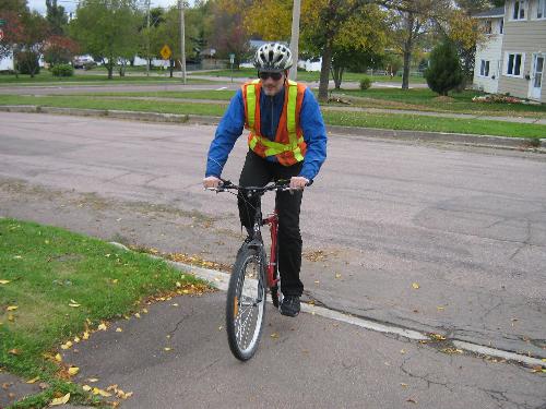 All weather cycling. - That blue jacket is waterproof. I have black waterproof pants designed for cycling as well. Still get a little damp in a big rain but it is survivable. All weather cycling. - That blue jacket is waterproof. I have black waterproof pants designed for cycling as well. Still get a little damp in a big rain but it is survivable.
