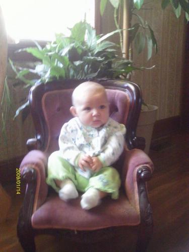 baby Keely in the Victorian child&#039;s chair - This is Miss Keely Jenn in the chair my neighbor sent over. An Unidentifiable chair.