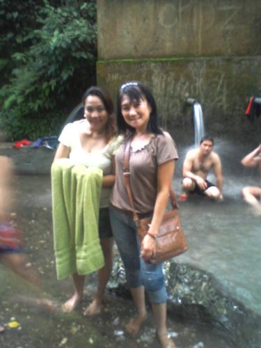 Fun by the Waterfalls's area - My boss and i at the reservoir area. At the back is her boyfriend, bathing with my other office mates.
