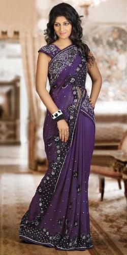 A women wear party wear sari - A women looking good on sari