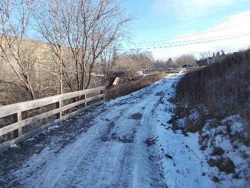 Wintery recreation trail. - Took this picture to test the settings on the camera. This is usually part of my commute to work on my bicycle each day. Too much snow on it means taking the road instead. The frozen slush is rough to ride on but for now it's still passable. Wintery recreation trail. - Took this picture to test the settings on the camera. This is usually part of my commute to work on my bicycle each day. Too much snow on it means taking the road instead. The frozen slush is rough to ride on but for now it's still passable.