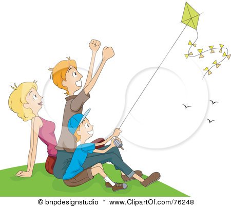 Flying kites with Mom and Dad - It is a lot of fun to fly kites with Mom and Dad.