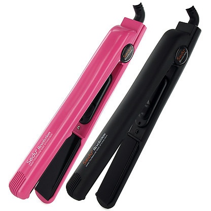 Hair iron - Hair flat iron or straightener.