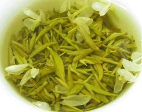 tea with jasmine - I love to drink tea with some flowers and always add to some jasmines or chrysanthemum to the tea I make. 