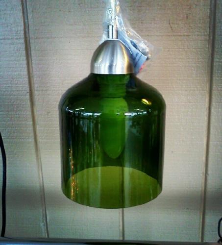 Upcycled wine jug - An upcycled wine jug, cut,polished and wired to be hung from ceiling, a pendant light