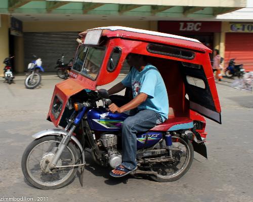 trisikad or tricycle - this is the trisikad or tricycle in the philippines. it is rampant in our place and this is the ride i used to rode during that time when i stumbled on the ground.