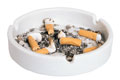 Ash Tray - cigarette stubs - This is a photo of a typical ashtray full of cigarette stubs, at home or at the office.