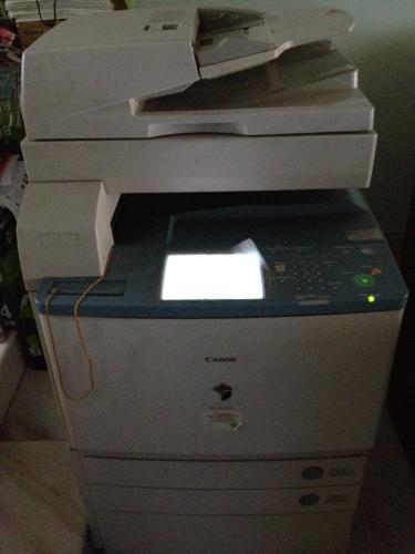 Canon office printer - A Canon office laser printer/scanner/fax machine that prints colored and non-colored documents, scans documents and sends them to your email as PDFs, and so on.