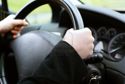 left or right hand drive - image of both hands holding the steering wheel