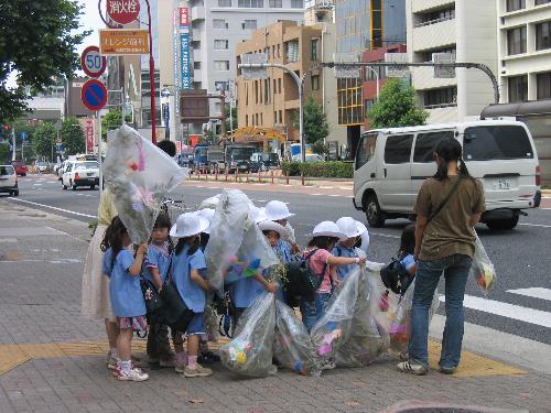 Nayoga children - This picture was taken by me on one of my trip to Nagoya in Japan. I found the image of the children going to school really give me an  natural yet artistic feel... that why i took it... hope that you guys agree with me too.