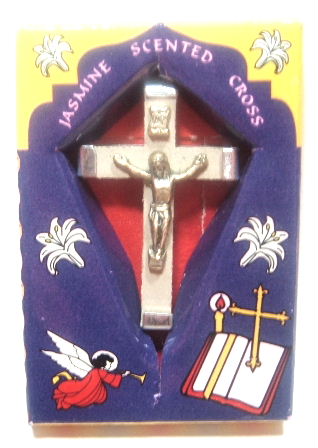 This is something that I sell to make a little extra money.  Beautiful Jasmine Flower Petal Crucifix  This beautiful crucifix is imported from the Holy Land and measures about 1 3/4' x 1 1/16'.    Lovely packaging makes it great for gift-giving. It is not only a great gift it has a loop at the top that would make it a great addition to your supplies if you make rosaries or religious jewelry.    The cross is made of a special jasmine that grows in the Holy Land and symbolizes the cycle of life, youth, and vitality. If you are interested please contact me.   This crucifix is a wonderful treasure and the heavenly aroma from this crucifix will fill your heart with light, love, and life, which makes this crucifix very special.