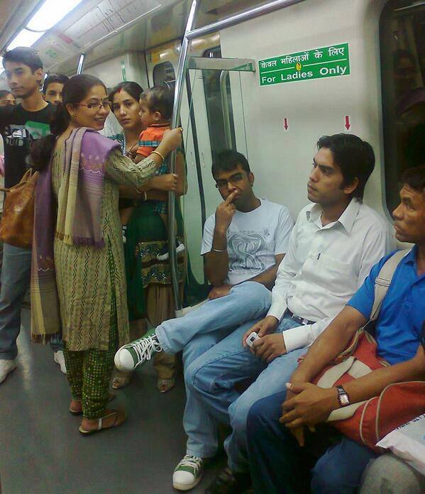 These Men Fought With A Lady Carrying Baby Over Seat On Delhi Metro.. Lets Make This Idiots Famous..!!