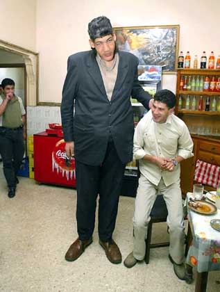 World's Tallest Man  - The 29-year-old Algerian Mounir Fourar is over 8 feet tall