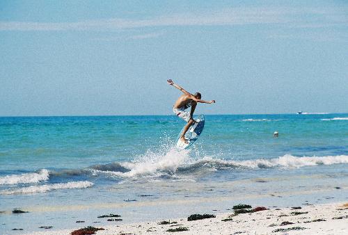 My favorite sport - This is my husband skimboarding.