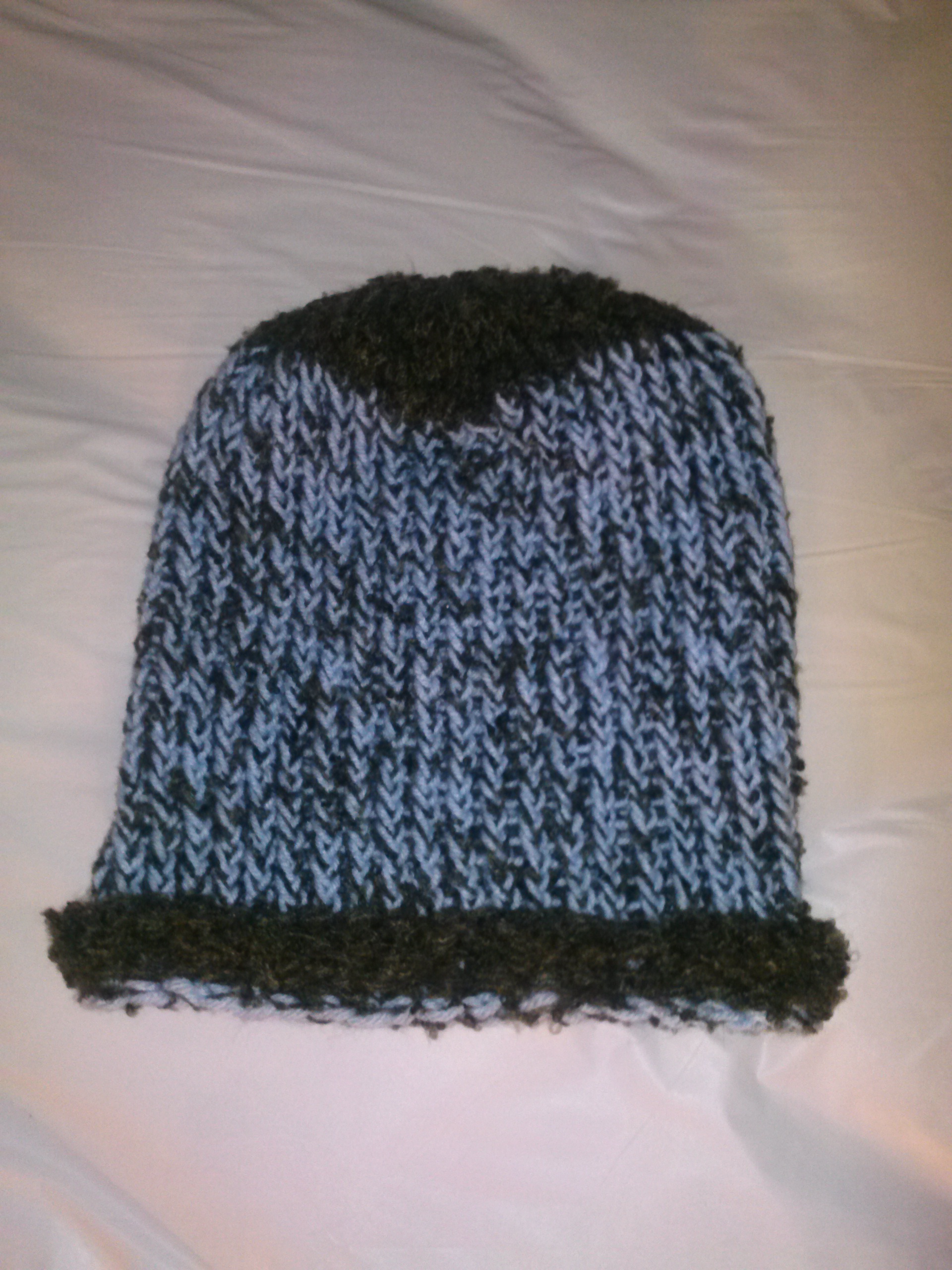 I crocheted this blue slouch hat and I thinking of a new color hat to crochet next.