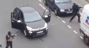 Terrorists firing at Charlie hebdo magazine office in France.