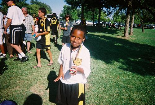 my youngest son at a soccer tournement - Paulos loves Soccer and he wants to be just like his Big Brother Brian