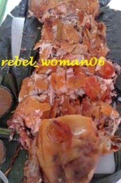 Here&#039;s a sample of lechon . As you can see the roasted pig&#039;s body was chopped already with the head intact still .  