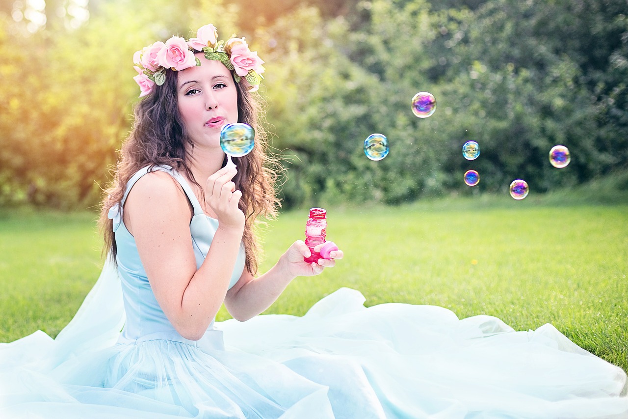 Pixabay Free Images https://pixabay.com/en/woman-blowing-bubbles-young-sitting-609252/