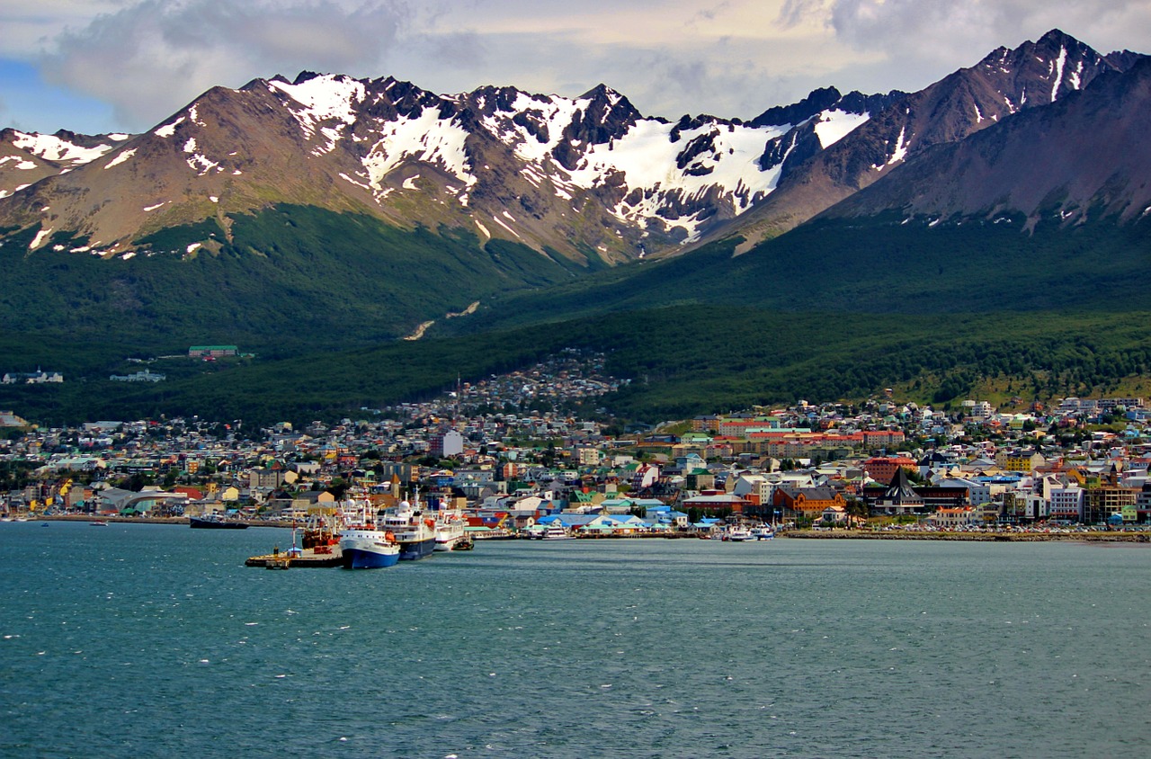 View of Ushuaia, a port city in Argentina with the snowcapped Martial Range in the background