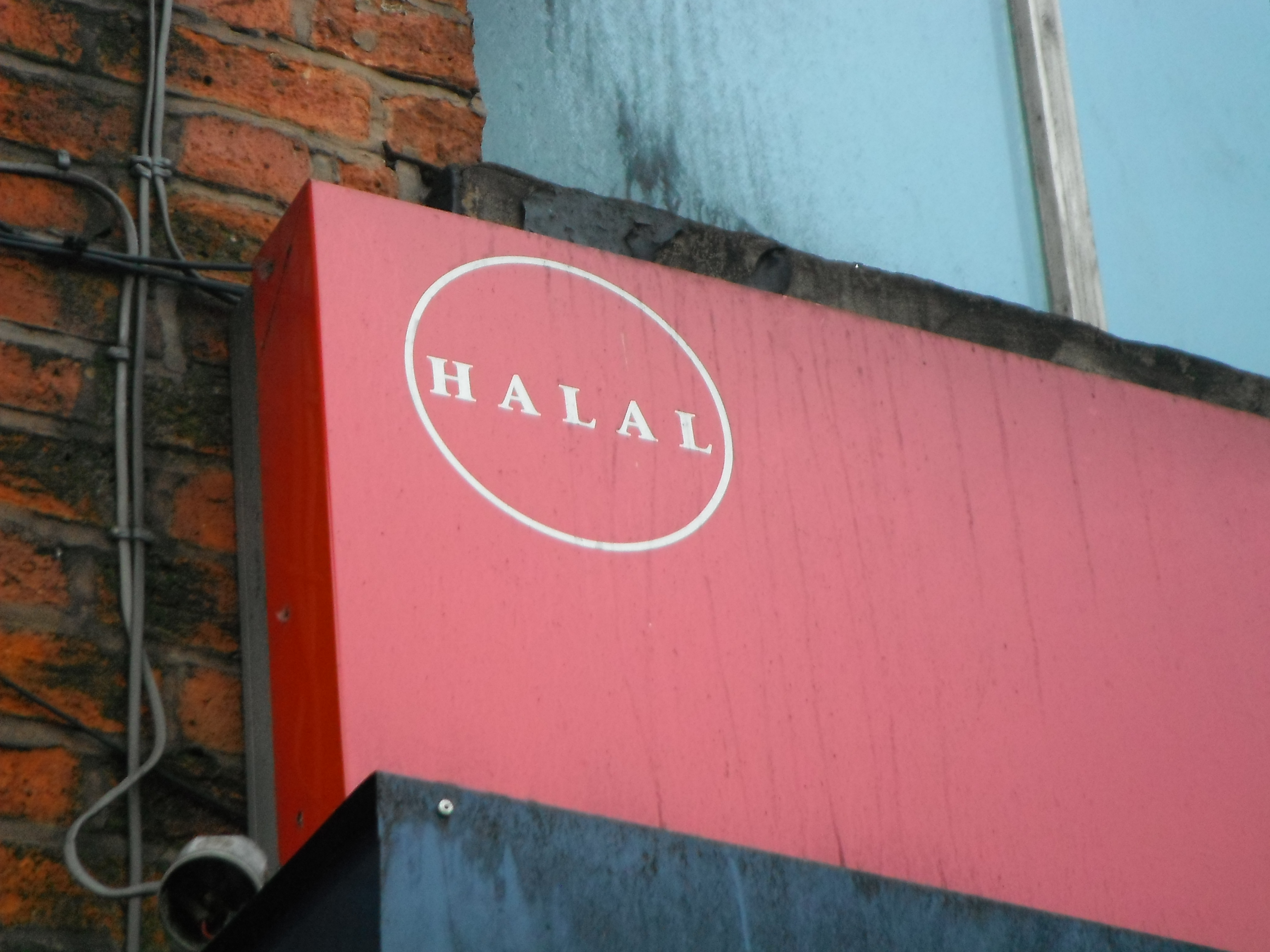 Photo taken by me – Halal food sign outside a Manchester restaurant 