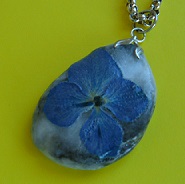 necklace made with a stone and flower. Personal photo. necklace made with a stone and flower. Personal photo.