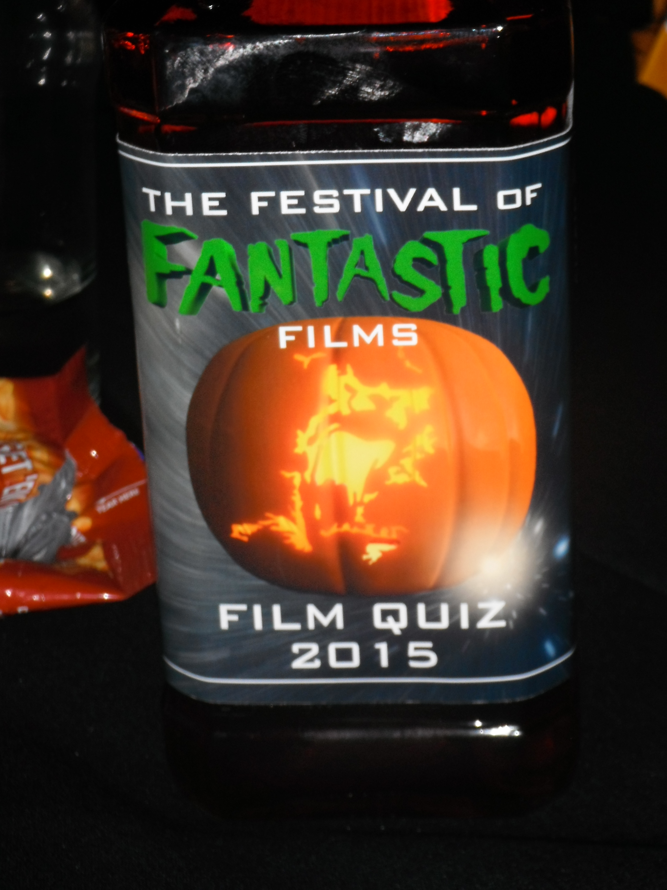 Photo taken by me – The Festival Logo on a quiz night whisky bottle prize (won by the team I played on). 