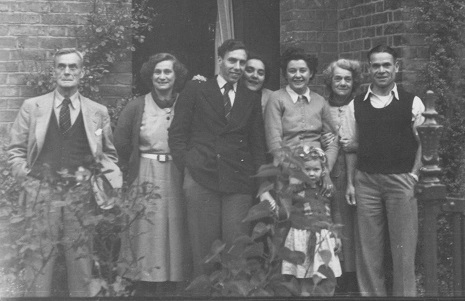 A family group from c. 1953.  I&#039;m the small blonde right in front.