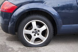 Flat tire image from Pixabay