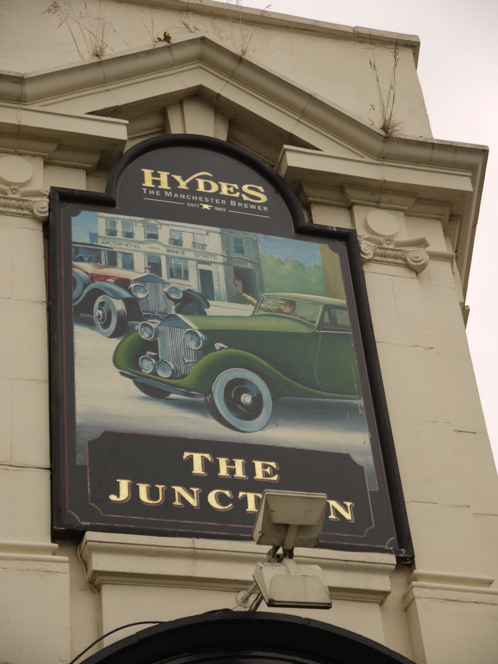 Photo taken by me – cars on The Junction pub sign, Hulme, Manchester Photo taken by me – cars on The Junction pub sign, Hulme, Manchester