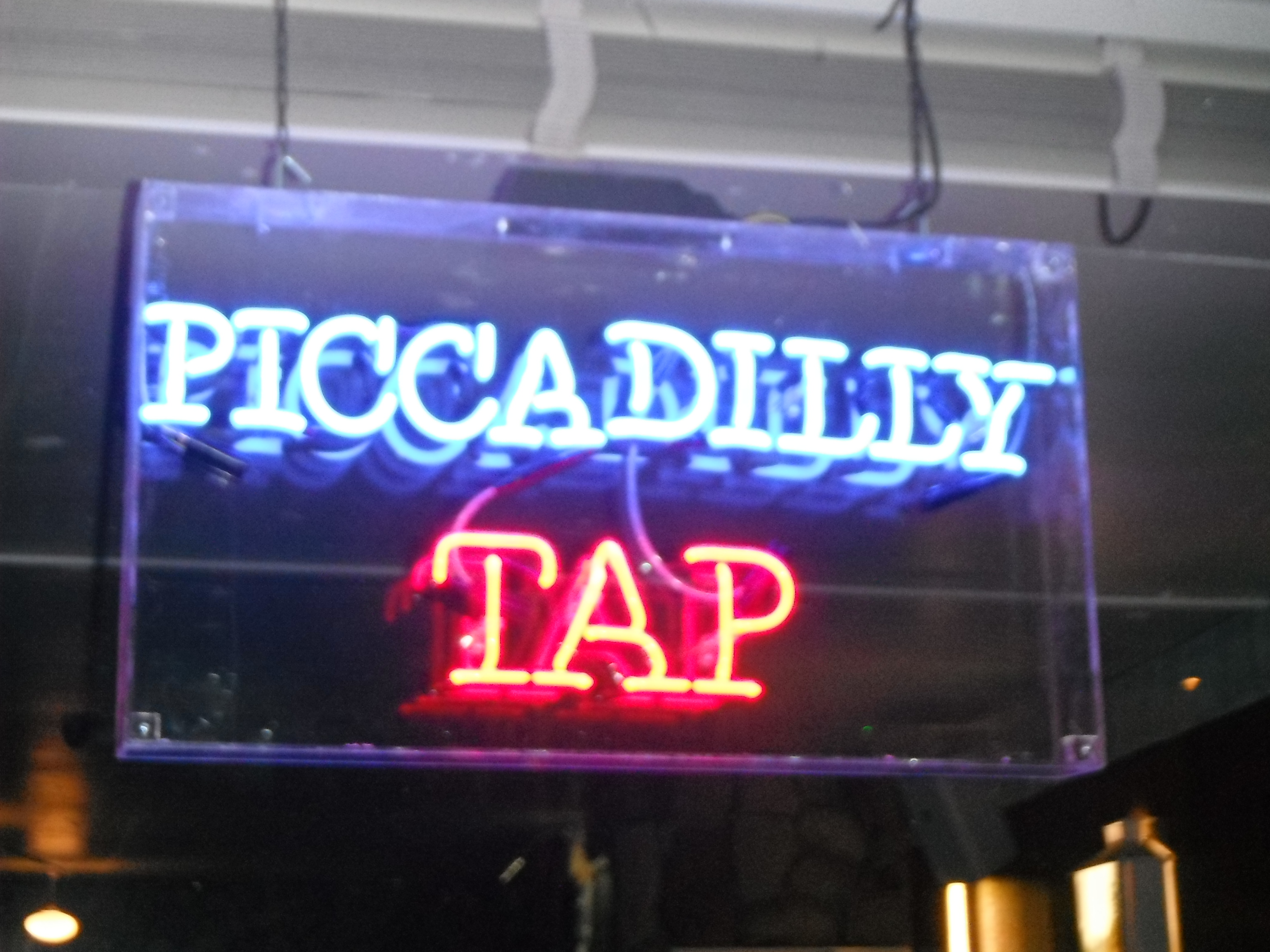 Photo taken by me – the Piccadilly Tap neon pub sign