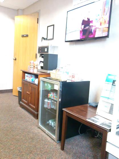 my view of part of the waiting room at the dealership