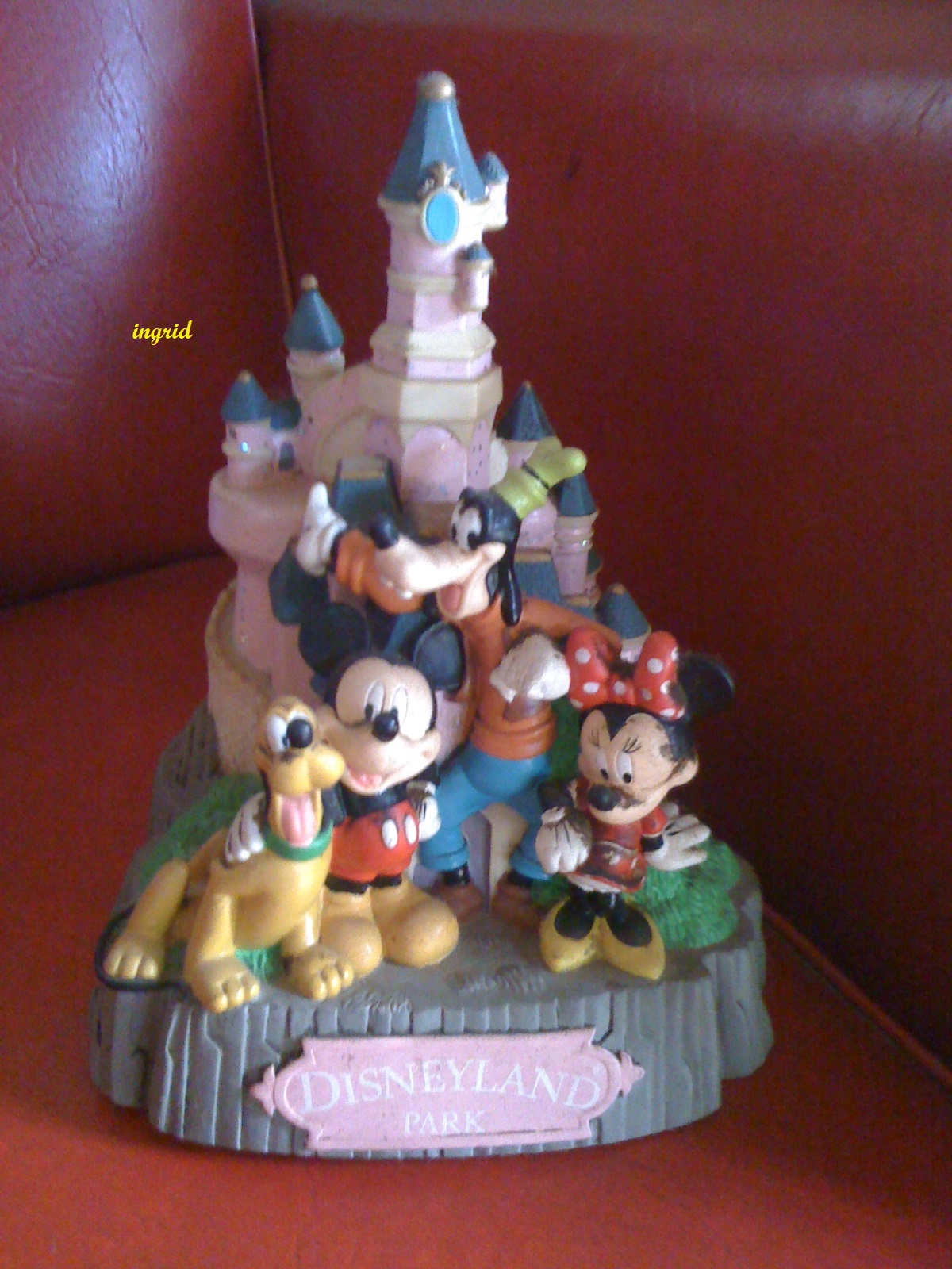 a figurine of walt Disney characters from our cabinet
