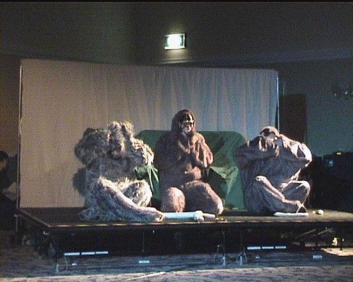 Photo taken by audience members – me as a gorilla with two other members of the cast of a science fiction convention play. Photo taken by audience members – me as a gorilla with two other members of the cast of a science fiction convention play.
